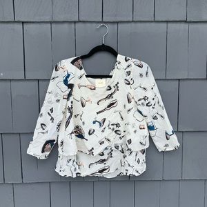 White ruffle graphic print blouse